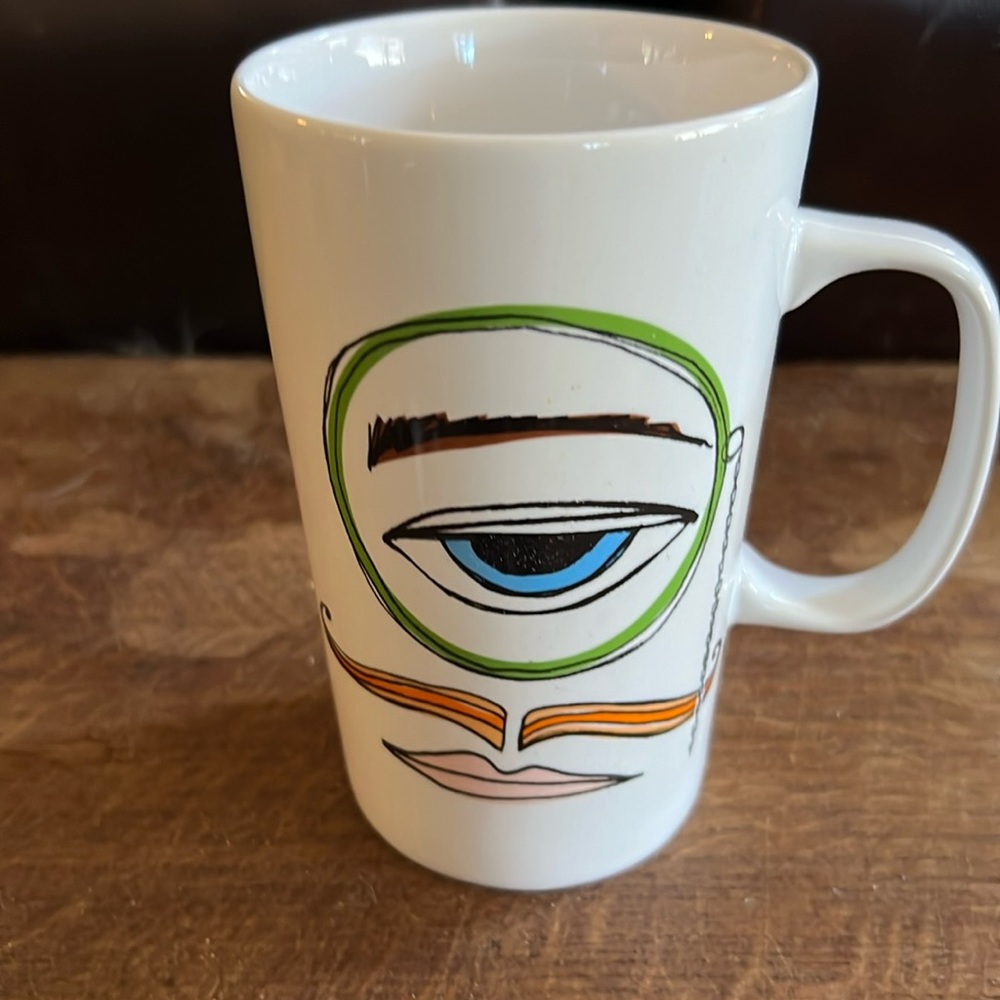 STARBUCKS
 Monocle Man, 16 fl oz